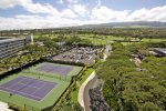 Two Lit Tennis Courts and Outdoor Parking